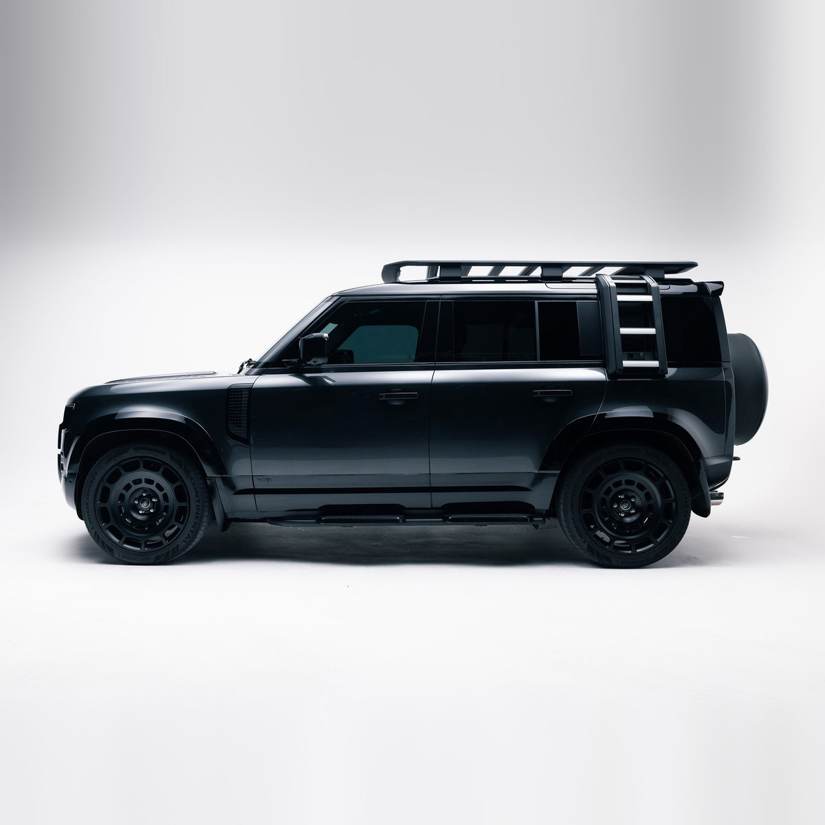 Land Rover Defender 110 with Gloss Black Exterior Styling Pack, side profile