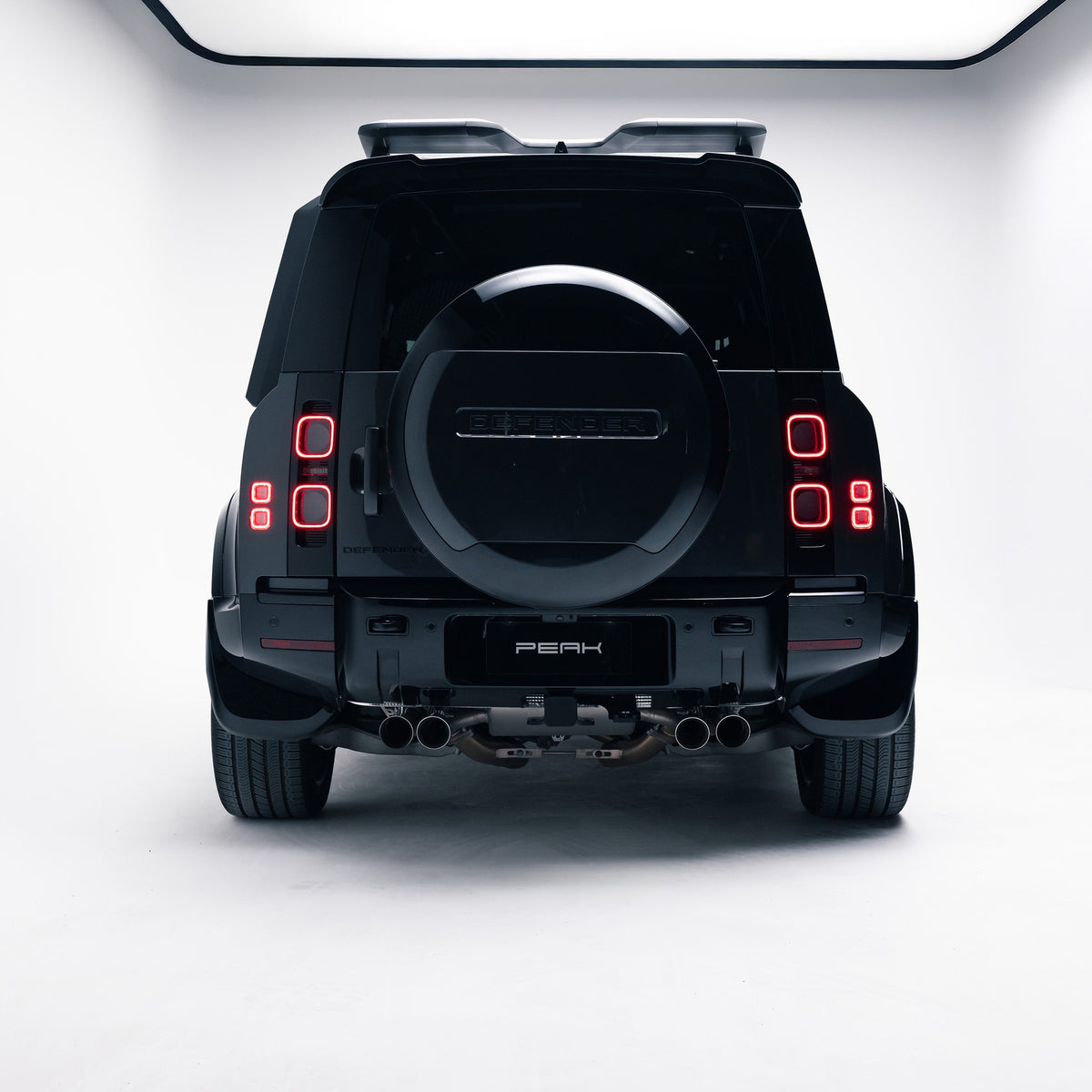 Land Rover Defender 110 with Gloss Black Exterior Styling Pack, rear view