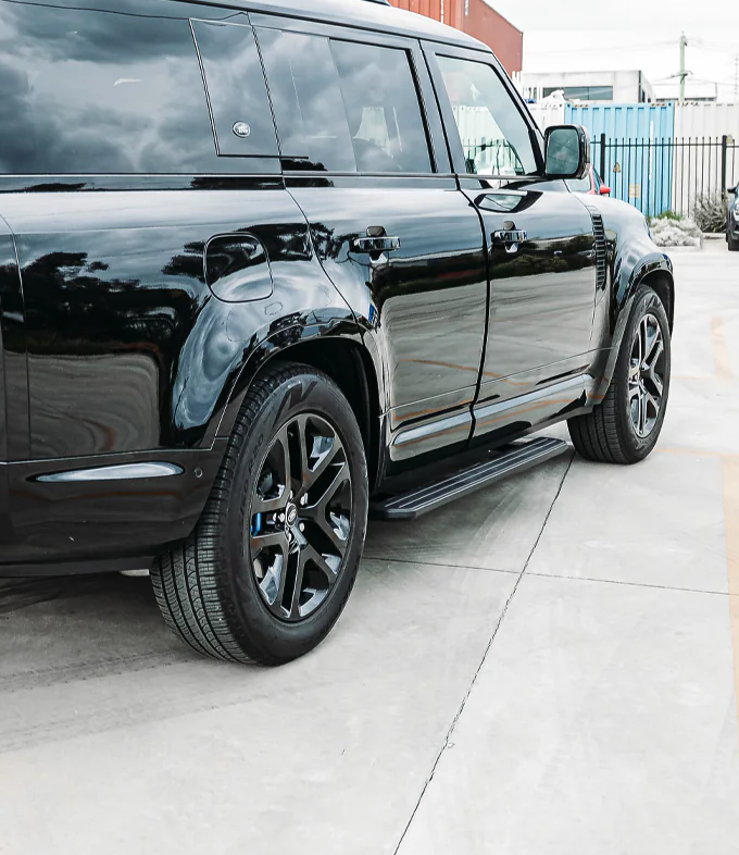 Black Electric Side Steps for Land Rover Defender 110 and 130 (L663), view 10