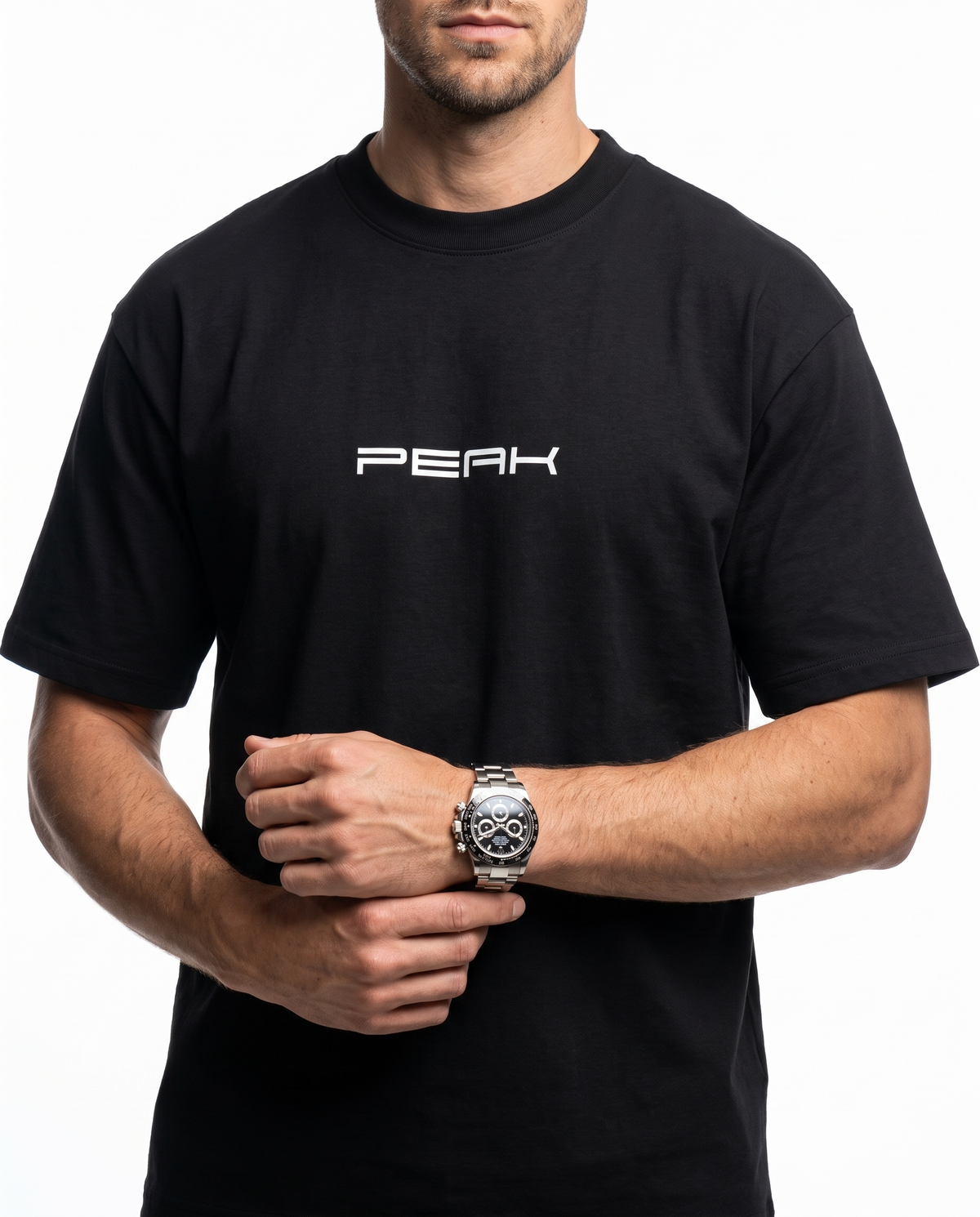 Close-up of the PEAK wordmark and heavyweight cotton on the PEAK Heavy Tee in Black