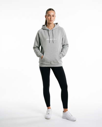 Woman wearing the PEAK Supply Hoodie in Grey