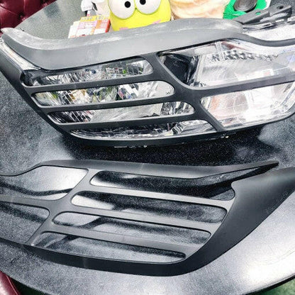 Headlight Guards for SsangYong Musso (Pair).